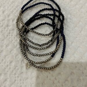 6 navy and silver bracelets